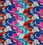 Tissu polyester multicolore à motifs traditionnels de tatouages ​​et de frangipanier | Tissus Islands